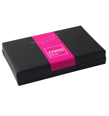 Cosméticos negros y caja de empaquetado del regalo de papel rosado para las botellas cosméticas