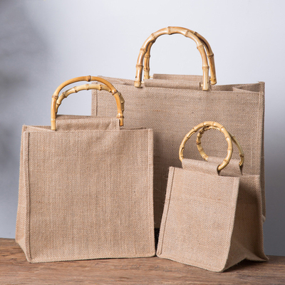 Buen precio Manija de bambú reutilizable de Tote Bag Jute Tote Bag de la arpillera que hace compras en línea